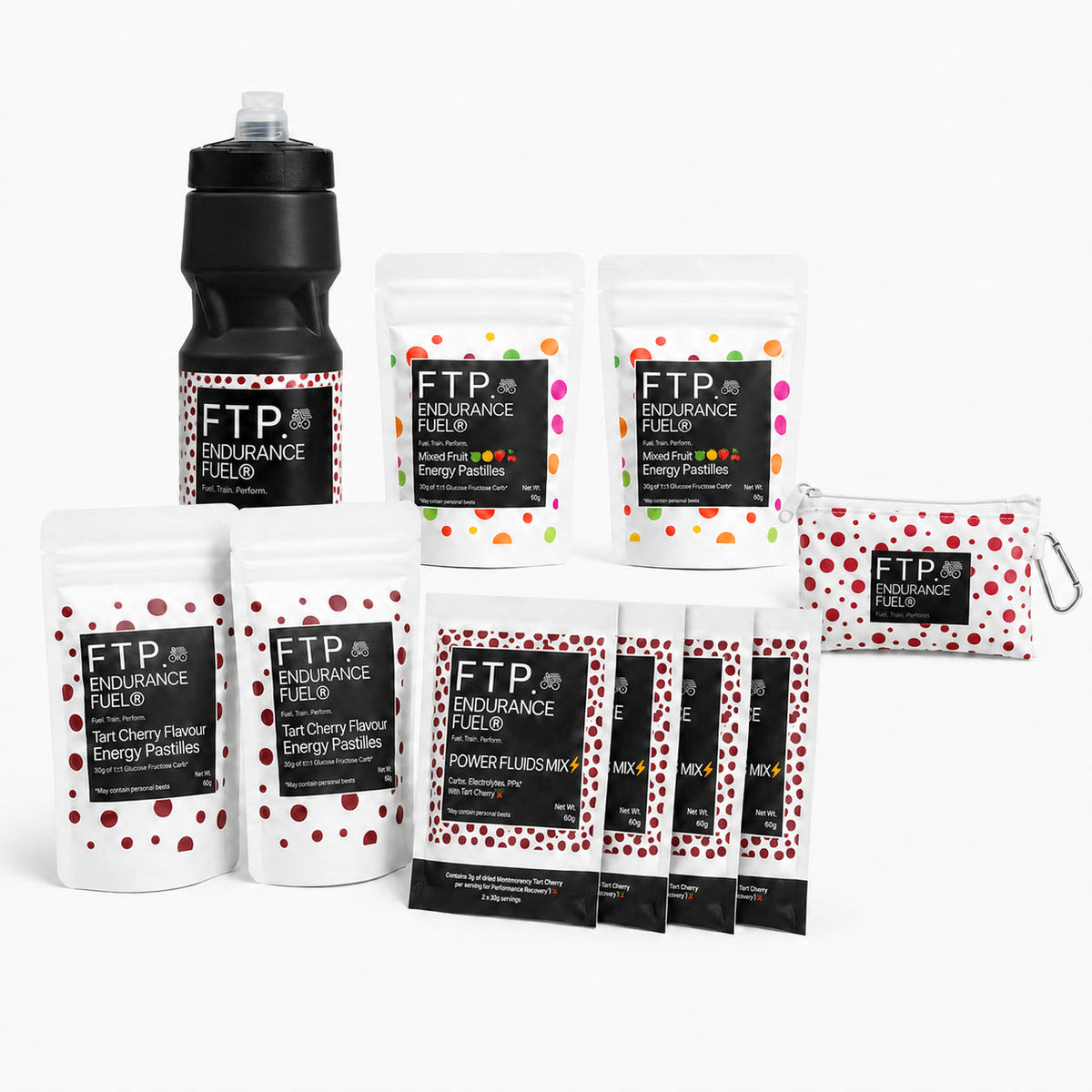 Long Session Stack contents - Mixed Fruit and Tart Cherry energy pastille taster packs, four Tart Cherry Power Fluids sachets, matte black 710ml bottle and Adventure Pouch