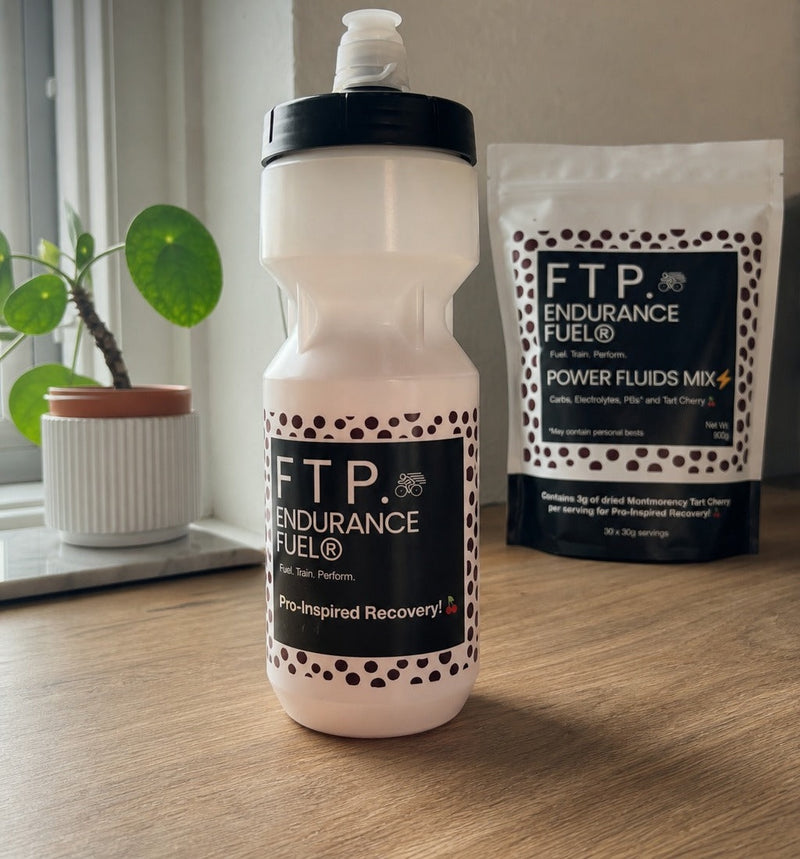FTP sports bottle and Power Fluids Mix pouch on a windowsill